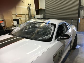 Windshield tech installing a new windshield
