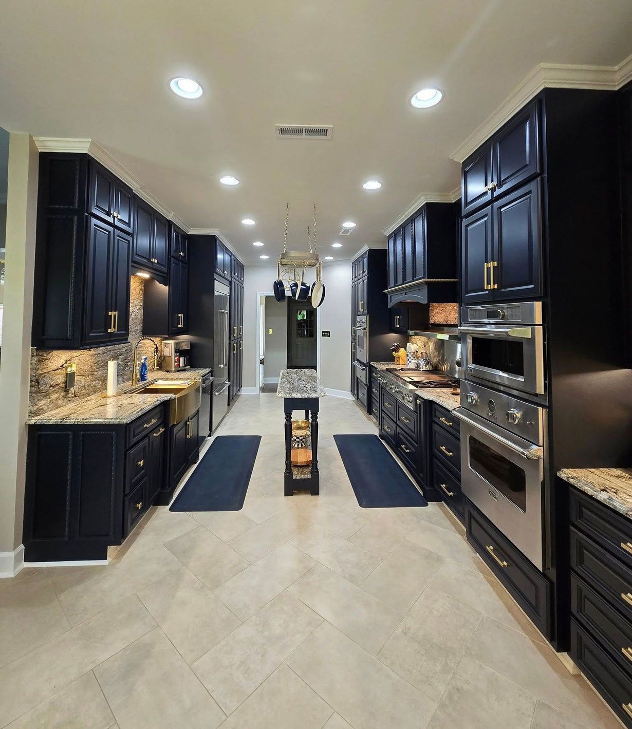 A kitchen with wooden cabinets