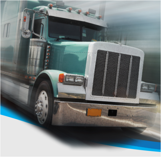 White and teal semi-truck speeding on a highway, with motion blur in the background