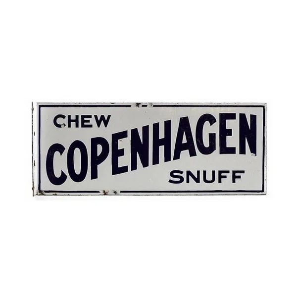 White sign reading “CHEW COPENHAGEN SNUFF” in bold black text.