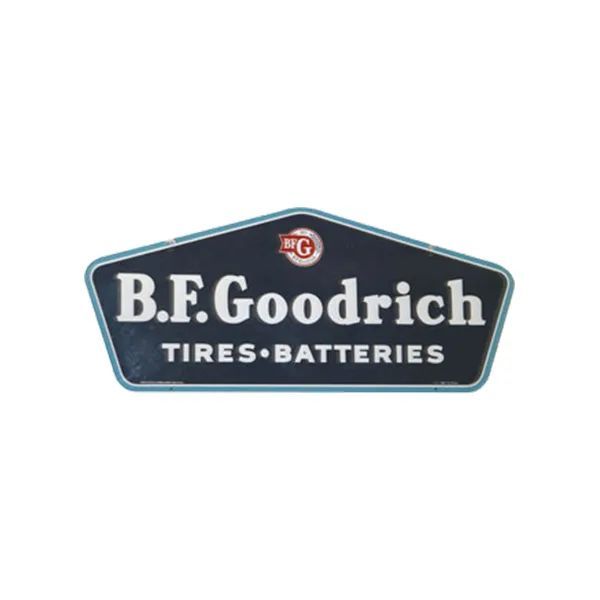 B.F. Goodrich Tires-Batteries logo on a dark shield-shaped sign with teal outline