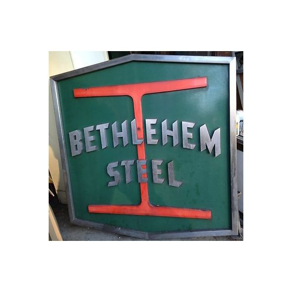 Bethlehem Steel sign with green background and red stylized I-beam logo