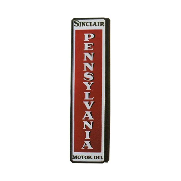 Vintage Sinclair Pennsylvania Motor Oil sign with red vertical lettering on a white background