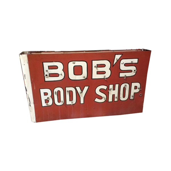 Red vintage sign reading “BOB’S BODY SHOP” in white letters on a red background