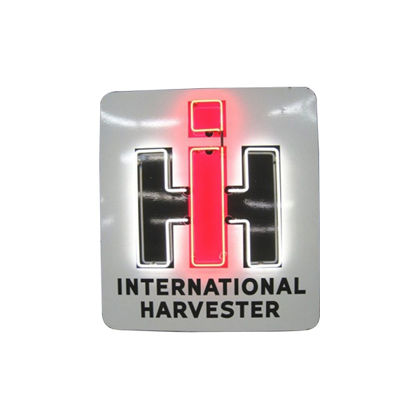 International Harvester logo with a red and black “IH” emblem on a silver background