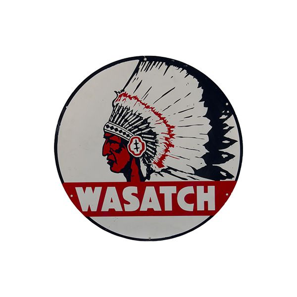 Circular Wasatch logo with a Native chief headdress in red, white, and black on a white background