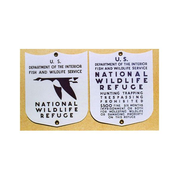 U.S. Fish and Wildlife Service National Wildlife Refuge warning sign with no hunting, trapping, or trespassing rules