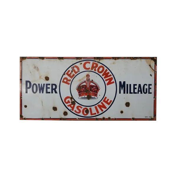Vintage Red Crown Gasoline sign with “Power” and “Mileage” on a weathered white background