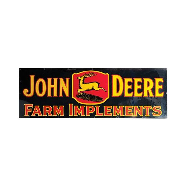 John Deere Farm Implements sign with yellow text and logo on black background