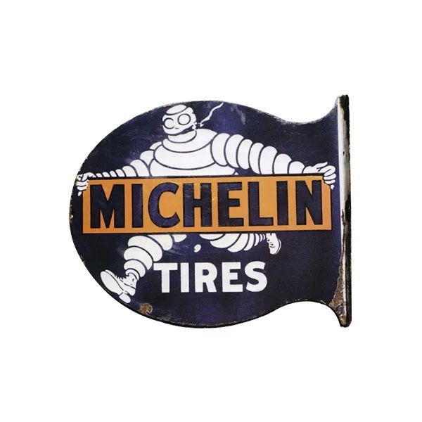 Michelin Tires sign with Bibendum mascot on a black background