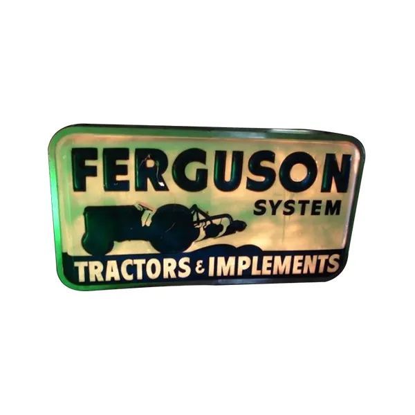 Vintage Ferguson System tractors and implements sign with green background and black lettering