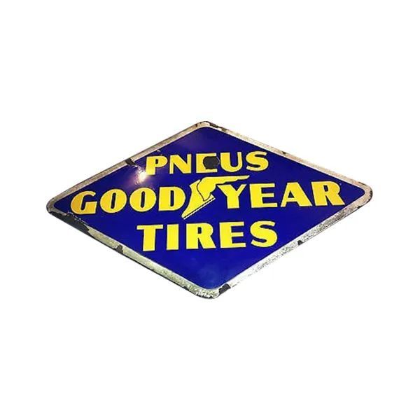 Blue diamond Goodyear Tires sign with yellow text and white border