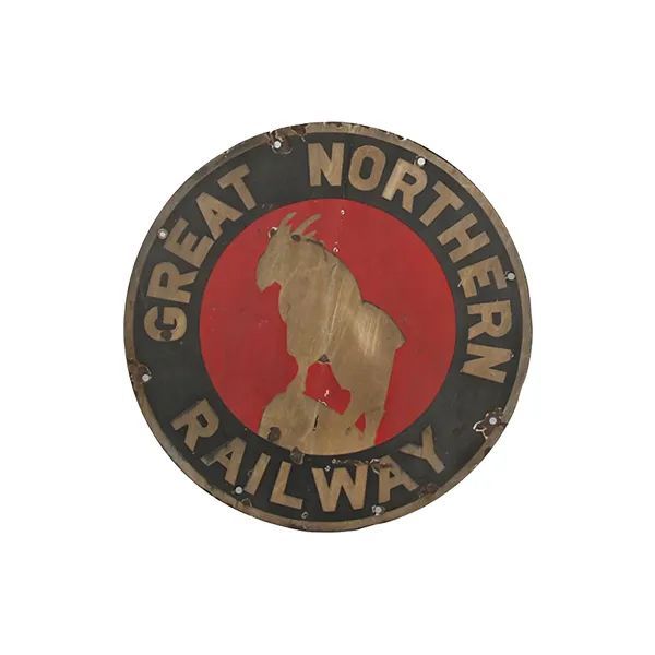 Great Northern Railway round logo with red center and gold bison on a dark background