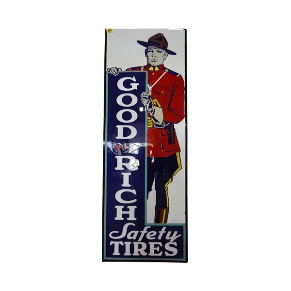Vintage Goodrich Safety Tires sign with a man in a red coat and hat