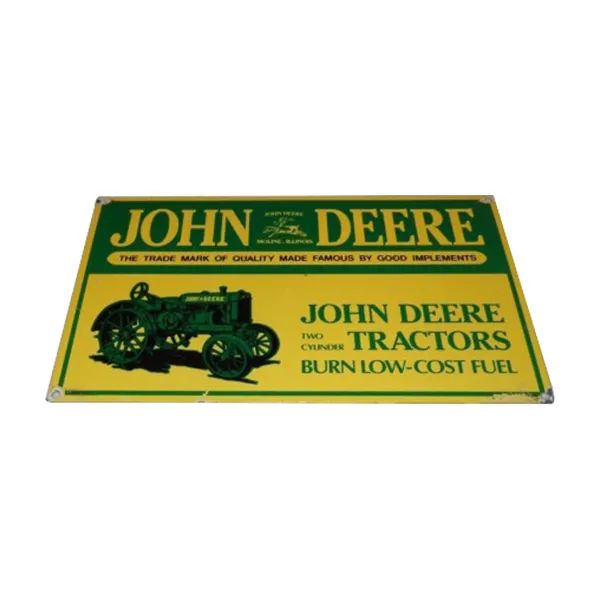 Vintage John Deere tractor fuel advertisement with green and yellow design and tractor illustration