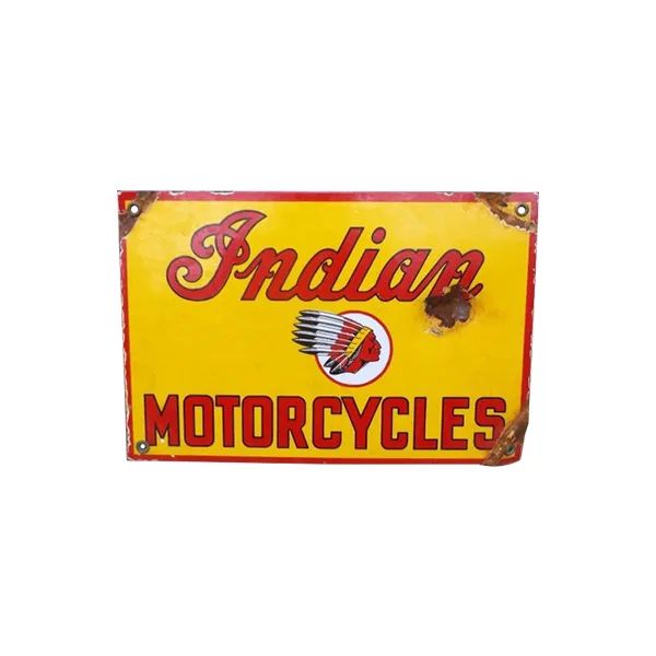 Vintage yellow Indian Motorcycles sign with red lettering and logo