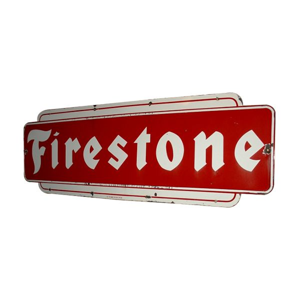 Red Firestone vintage sign with white lettering on a white background