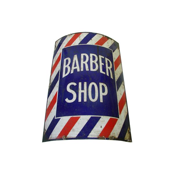 Barber shop pole sign with red, white, and blue stripes and “BARBER SHOP” text