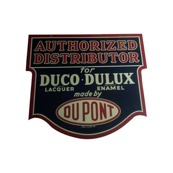 Vintage DuPont sign reading “Authorized Distributor for Duco Dulux Lacquer Enamel made by DuPont”