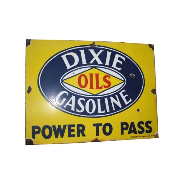 Vintage yellow Dixie Oils gasoline sign with blue oval logo and “POWER TO PASS” text