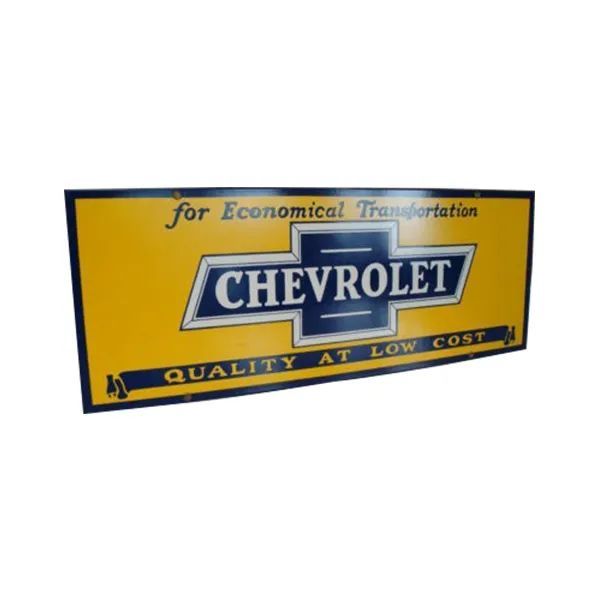 Yellow Chevrolet sign with blue logo and the words “For Economical Transportation” and “Quality at Low Cost”