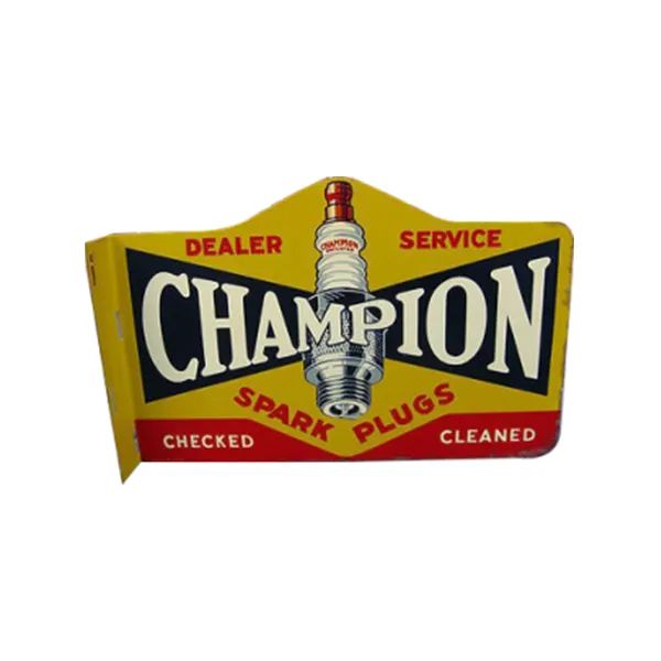 Yellow vintage Champion spark plug sign with red and white lettering