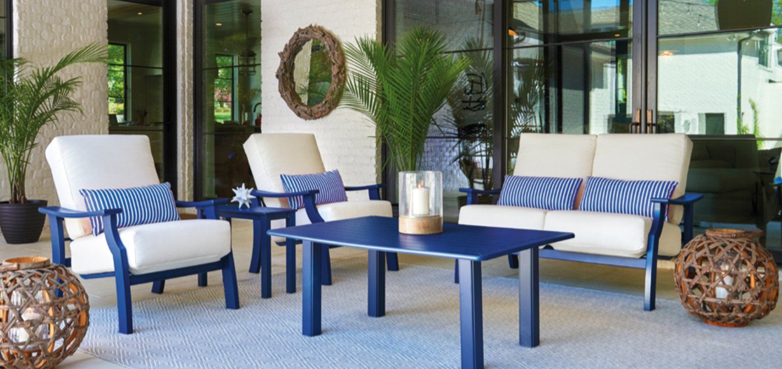 Modern chairs and table outside the house