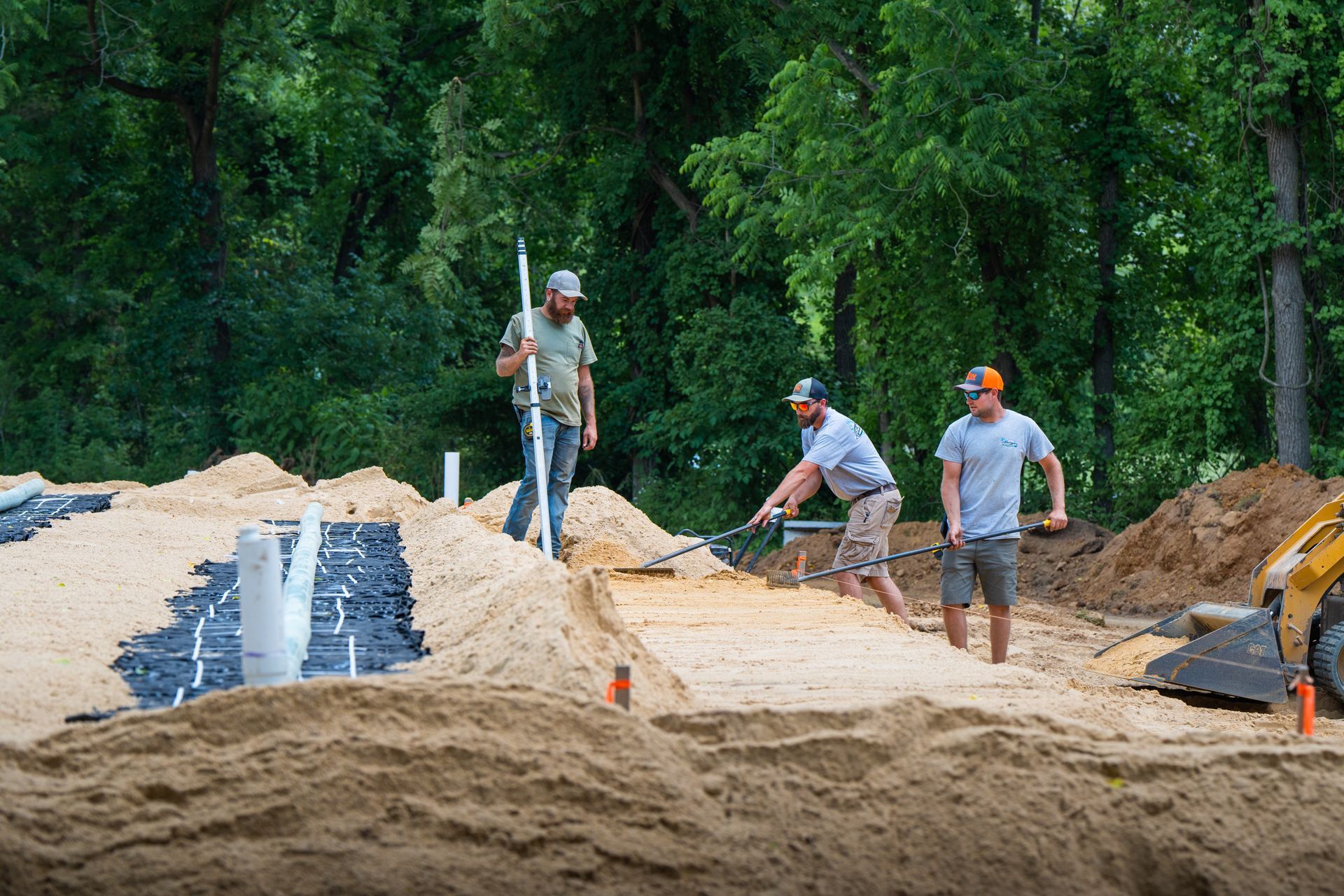 A group of men are working on a construction site.