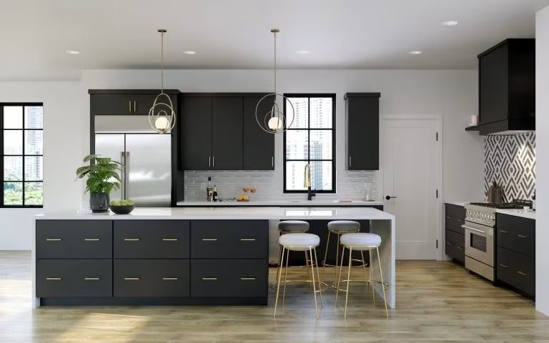 Modern black-and-white kitchen with island, pendant lights, wood floor, and large windows