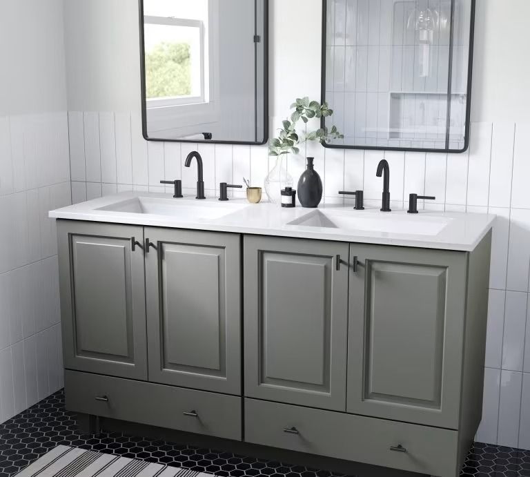 Modern bathroom with double gray vanity, black faucets, and round mirrors on white tile walls