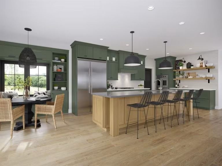 Modern kitchen with green cabinets, wood island, black barstools, and a dining nook by large windows