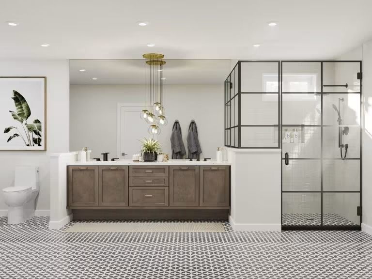 Modern bathroom with double vanity, shower enclosure, toilet, and patterned tile floor