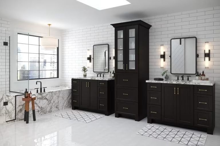 Modern bathroom with two dark vanities, mirrors, and a tall black cabinet on a white tiled floor.