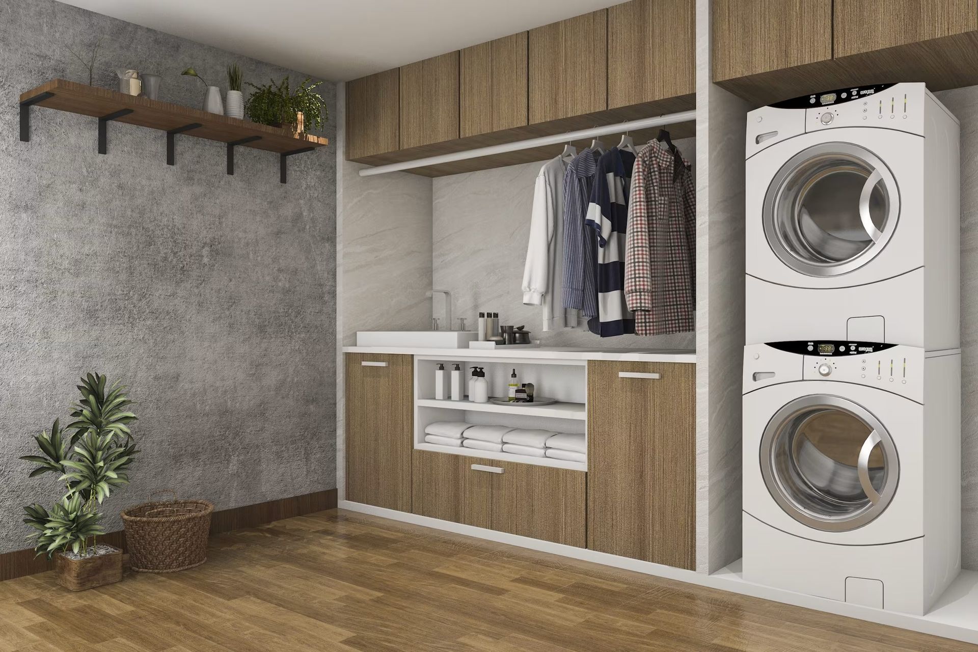 Modern laundry room with stacked washer-dryer, wood cabinets, sink, and plants on a gray wall