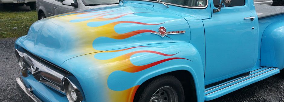 custom paint job - blue truck with orange flames