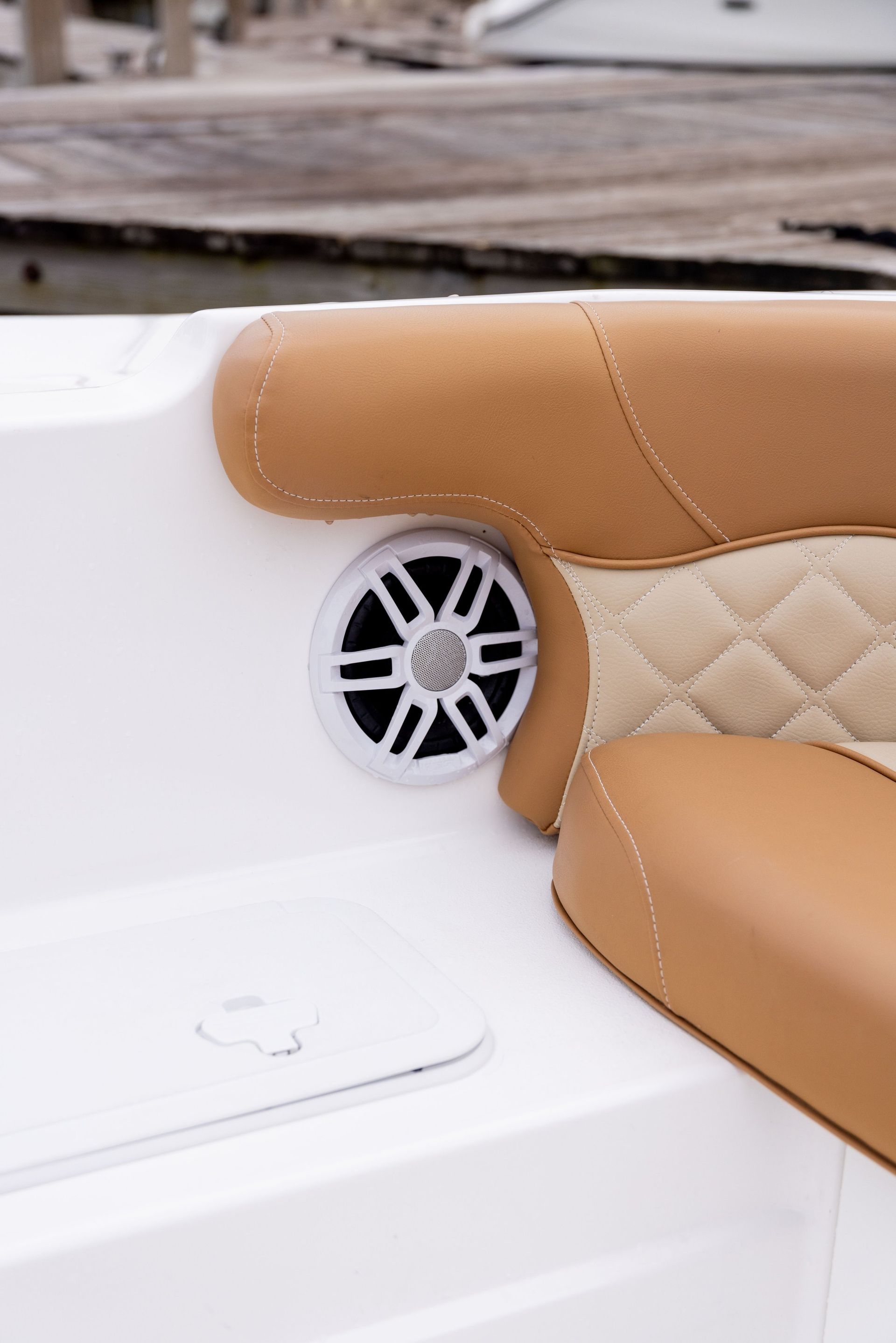 A boat with a speaker on the side of it