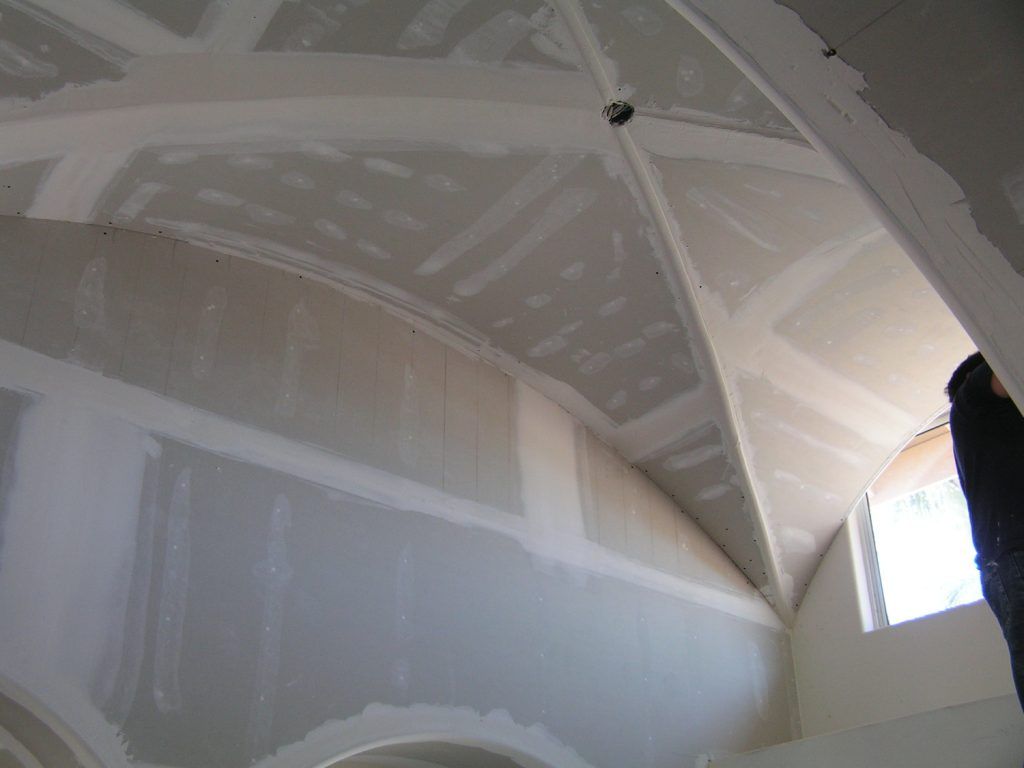 Looking up at the ceiling of a building under construction