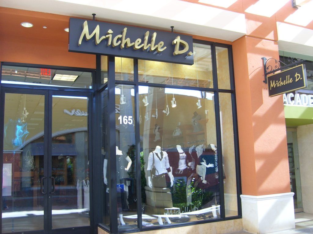 A michelle d. store with a sign above the door