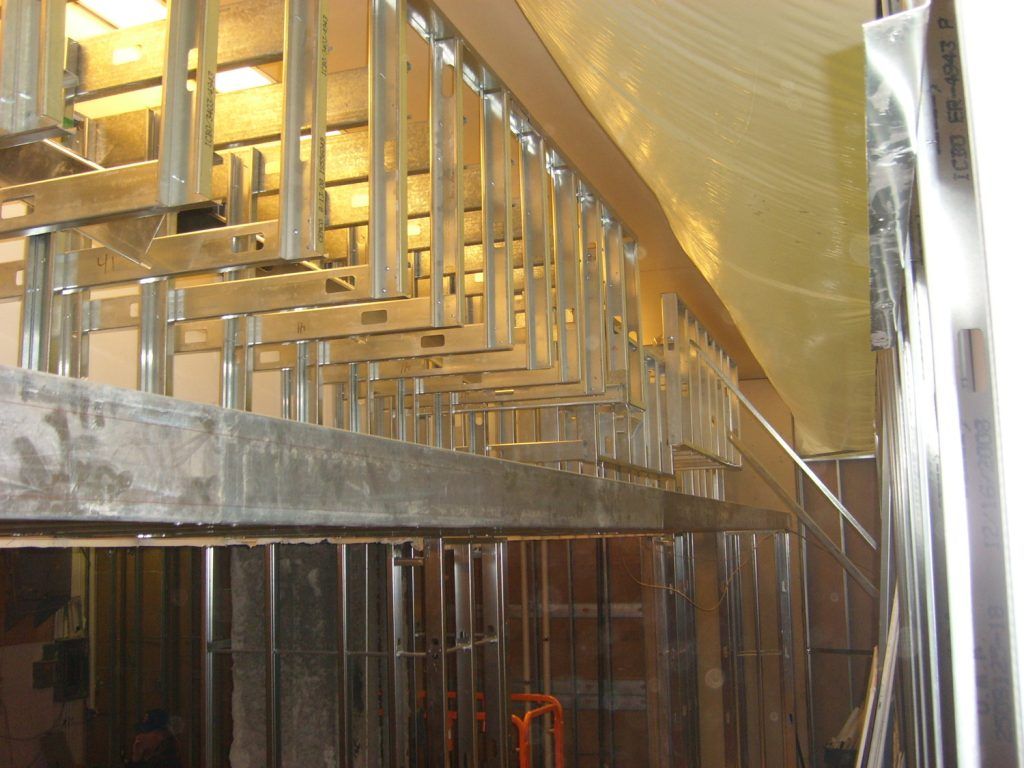 A staircase is being built in a building under construction