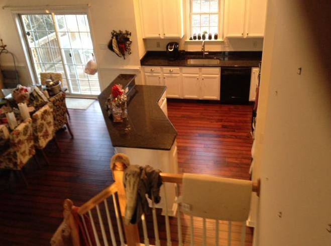 An aerial view of a kitchen from the second floor