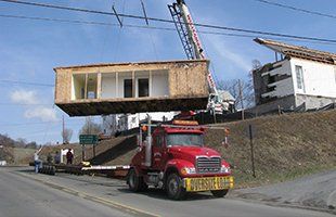 Part of house being lifted