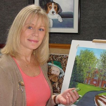 A brown and white dog is standing on its hind legs next to a door.