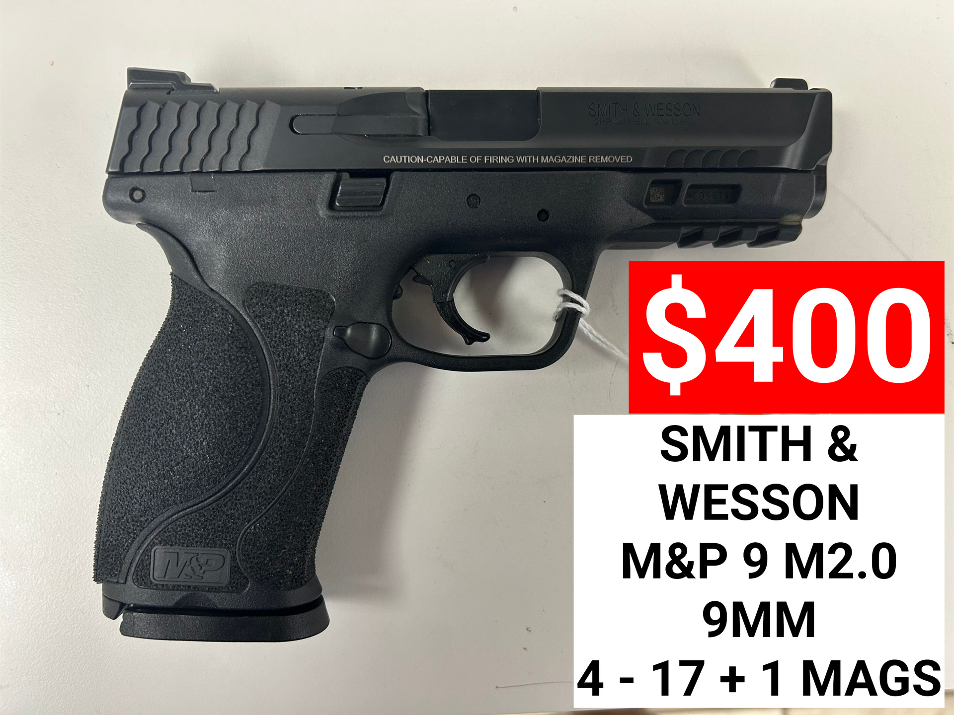 Black Smith & Wesson M&P 9 M2.0 9mm pistol with a $400 price tag and specs text.
