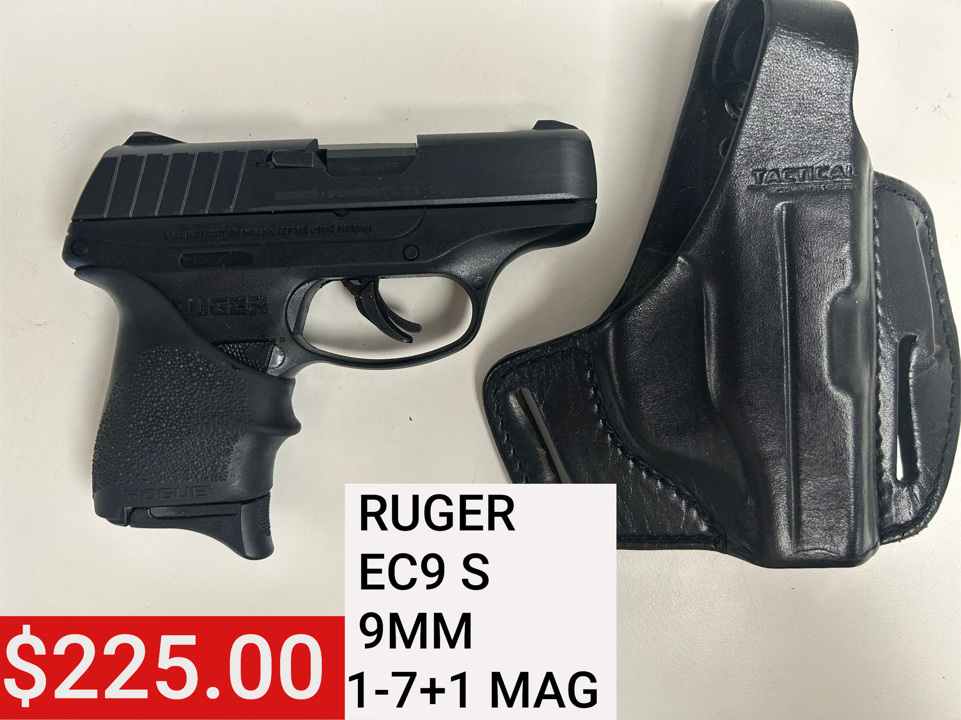 Black Ruger EC9s 9mm pistol with holster and $225 price tag on display.