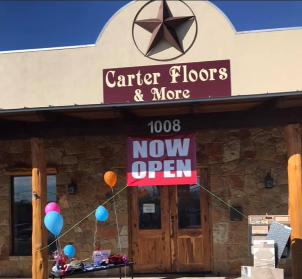 Carter Floors and More has a sign that says 