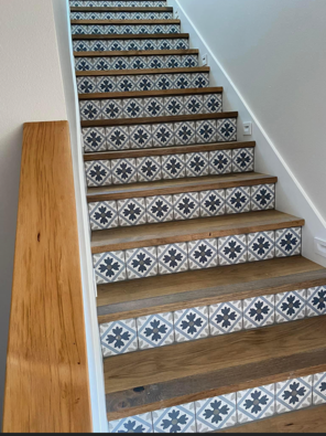 A set of stairs with tiles on the steps