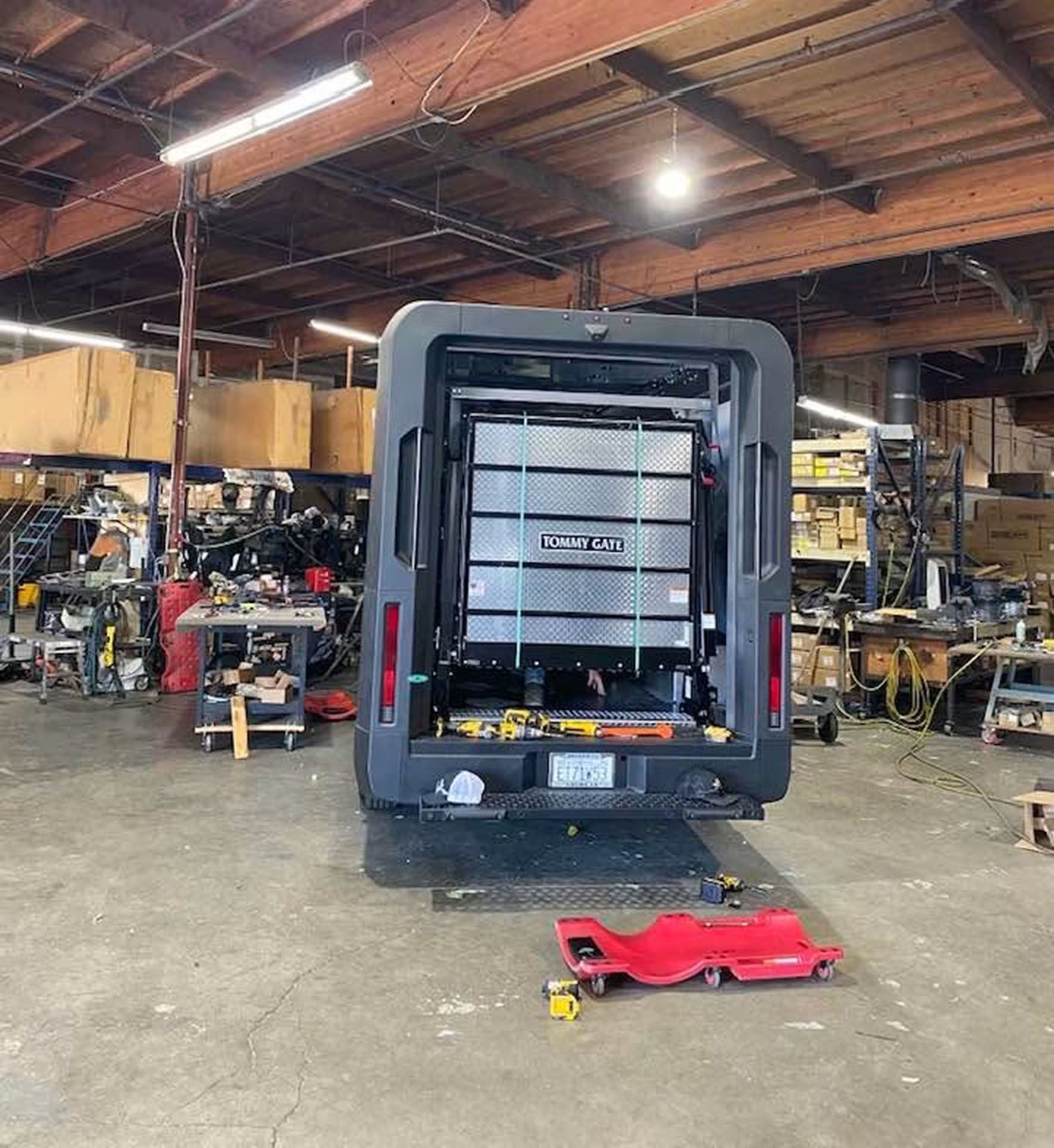 Repair shop interior with a gray truck