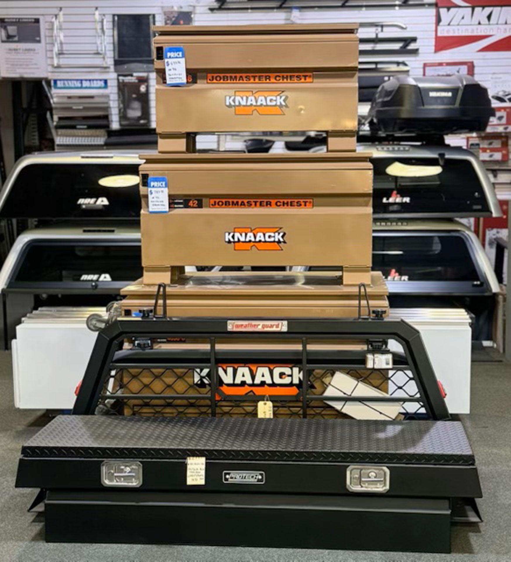 Tool chests stacked on a black contractor truck bed