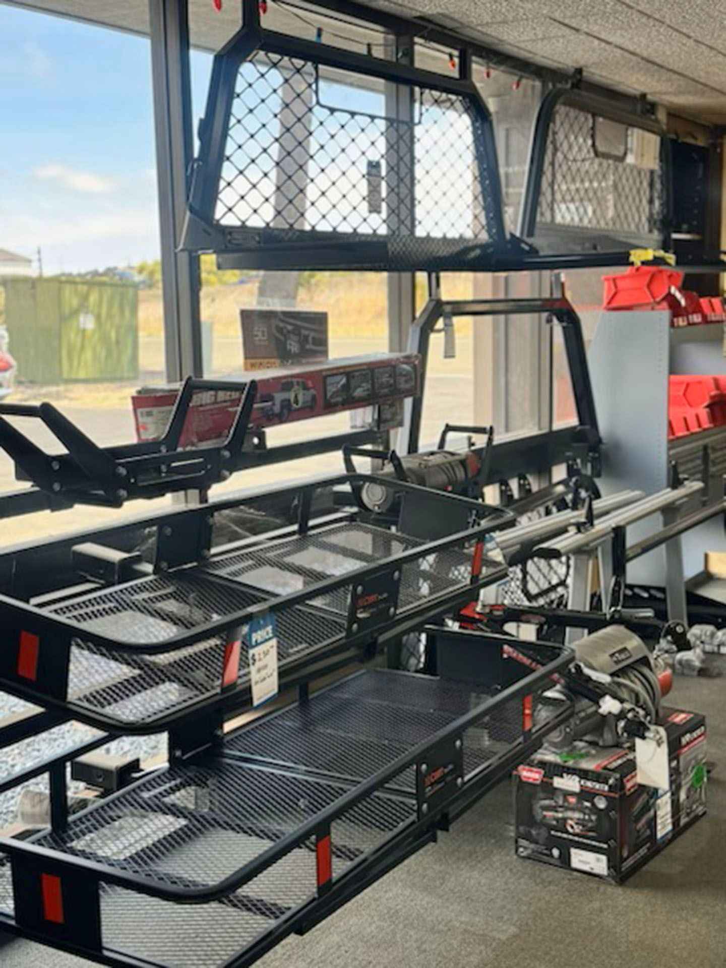 Black metal cargo racks and equipment in a workshop