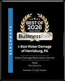 Award badge for 1-800 Water Damage of Harrisburg, PA. Best of 2026 award, gold and black.